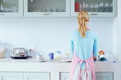 Woman washing dishes
